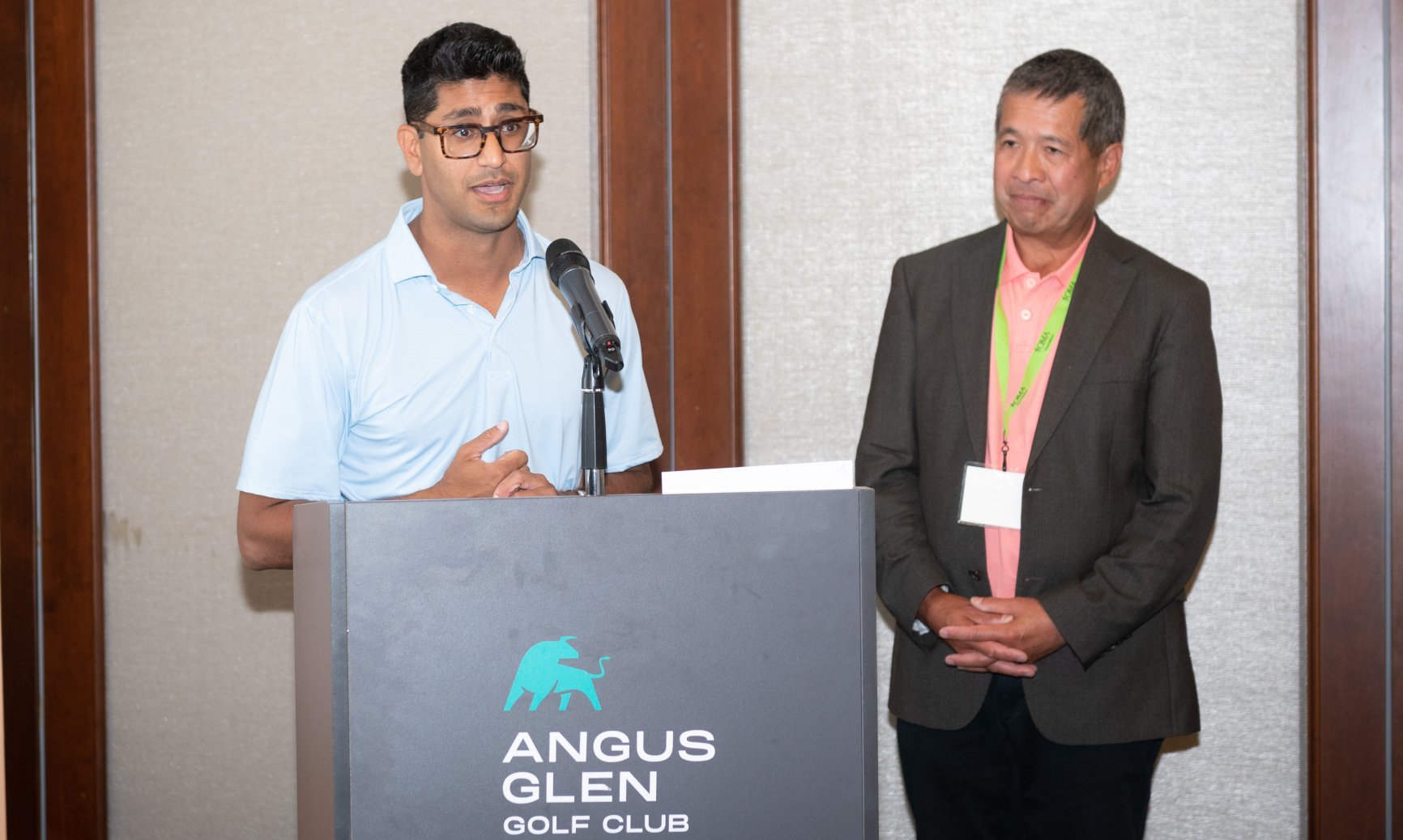 OMF President Dr. Albert Ng, right, and OMA past president Dr. Adam Kassam, both OMF golf committee co-chairs, thank participants and sponsors for their support during a luncheon following the tournament.