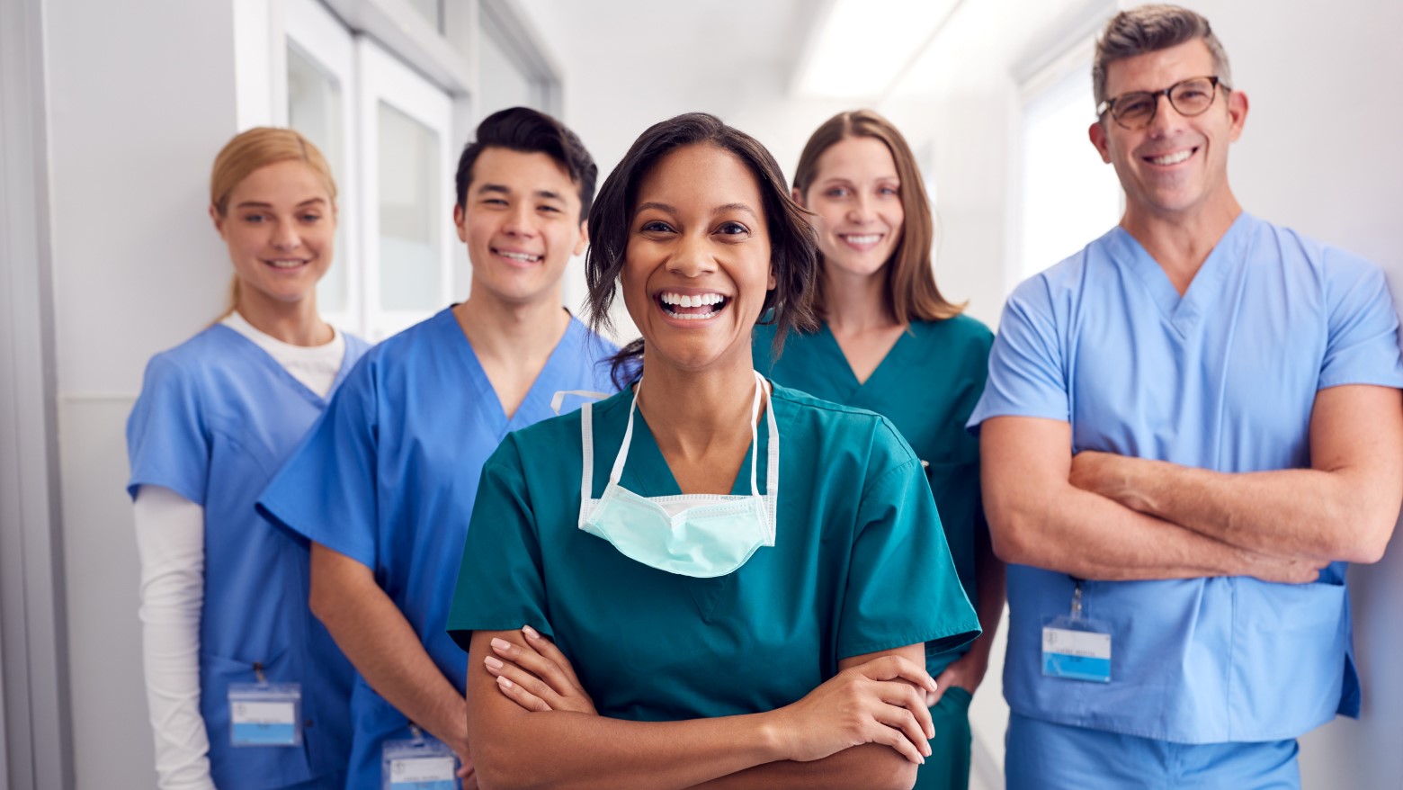 group of doctors standing together smiling