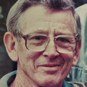A headshot of Dr. Peter Read Knight is seen.