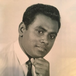 A headshot of Dr. Kenneth Sewchand is seen here.