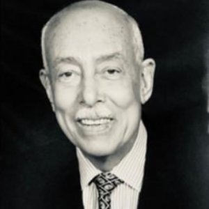 A headshot of Dr. Maurice Derek Shilletto is seen here.