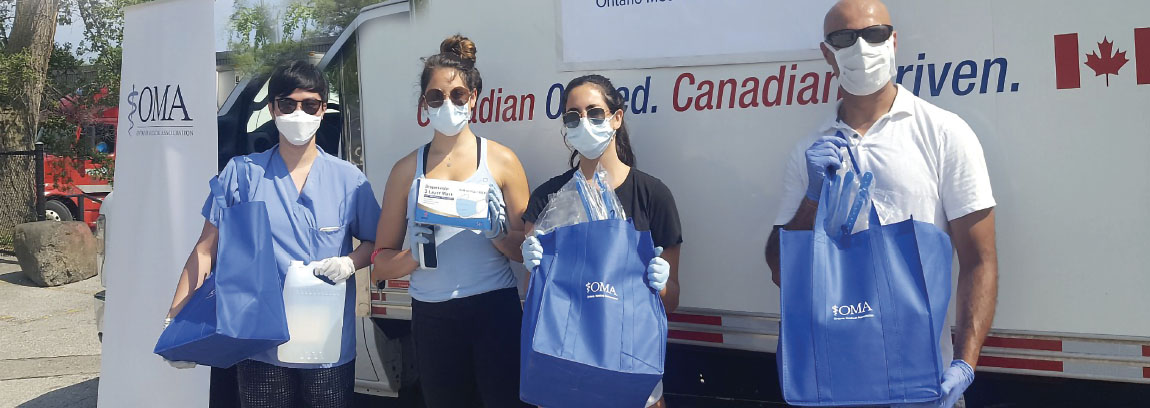 Volunteers at a COVID-19 personal protective equipment drive