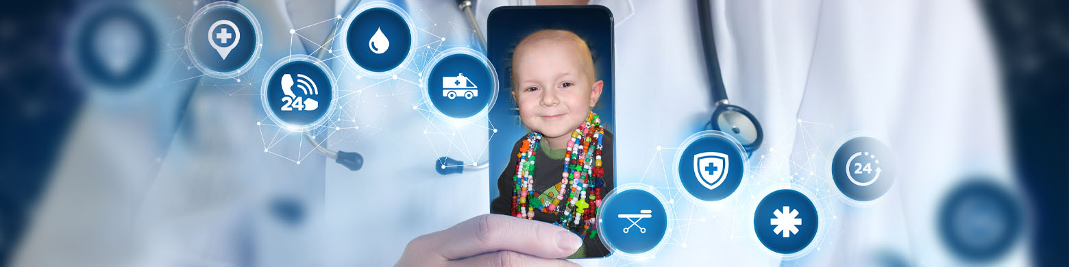 a doctor holding a phone with a photo of a young patient being displayed
