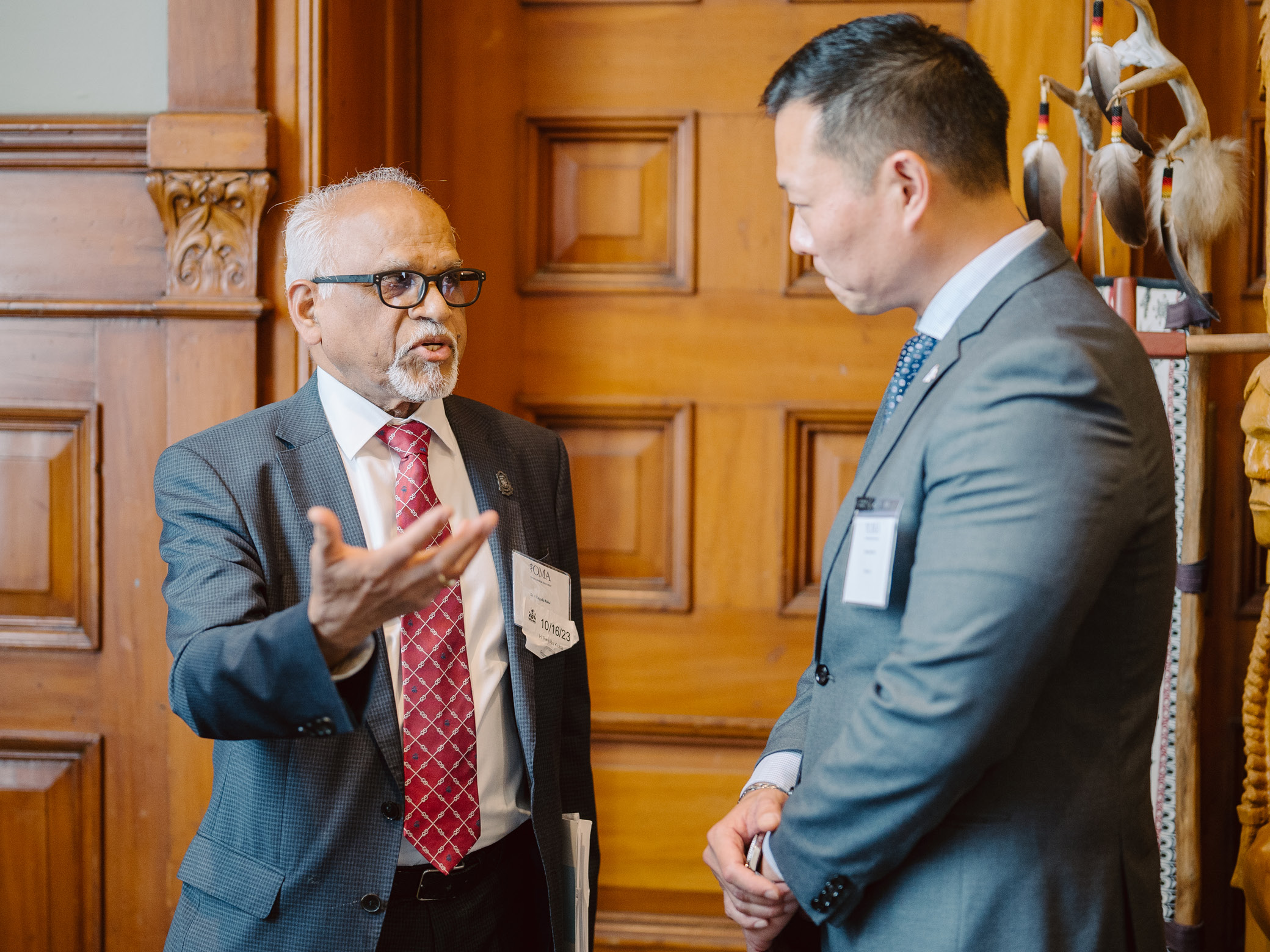 Dr. Rayudu Koka discusses with Stan Cho, minister of long-term care.